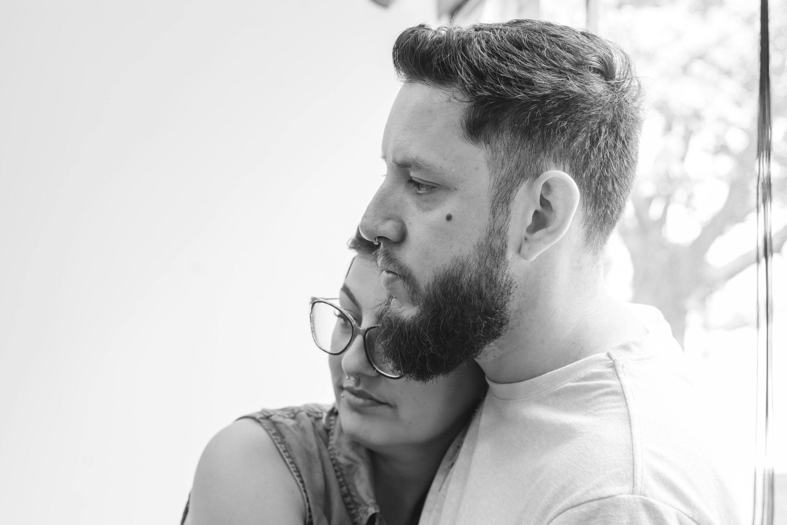 A new father embraces his partner while adjusting to the first few weeks of fatherhood.
