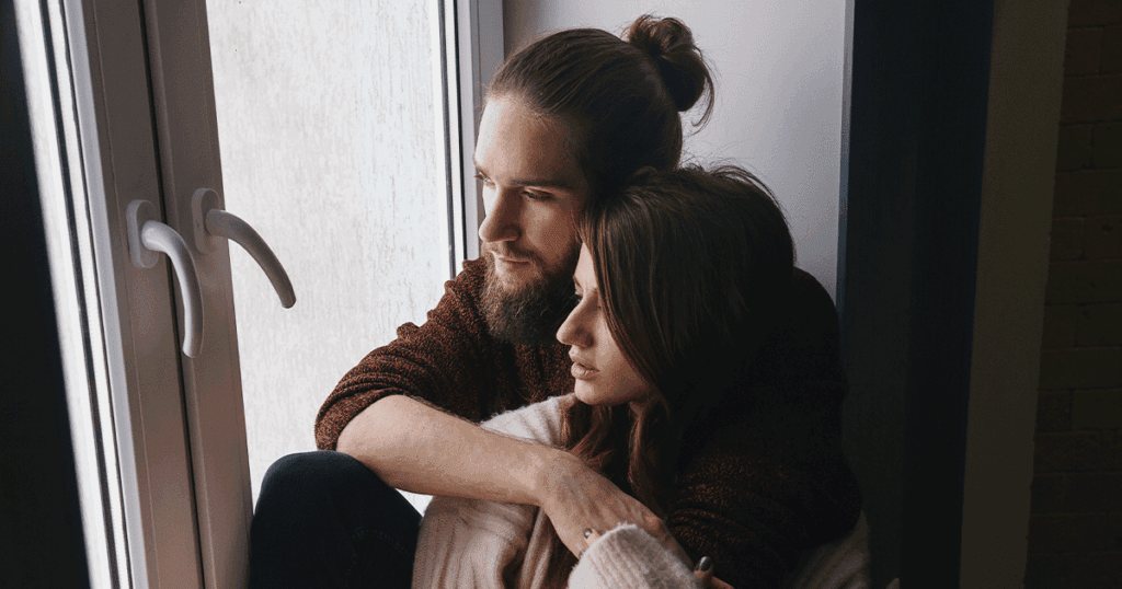 Couple preparing for parenthood and learning how to bond with their newborn.