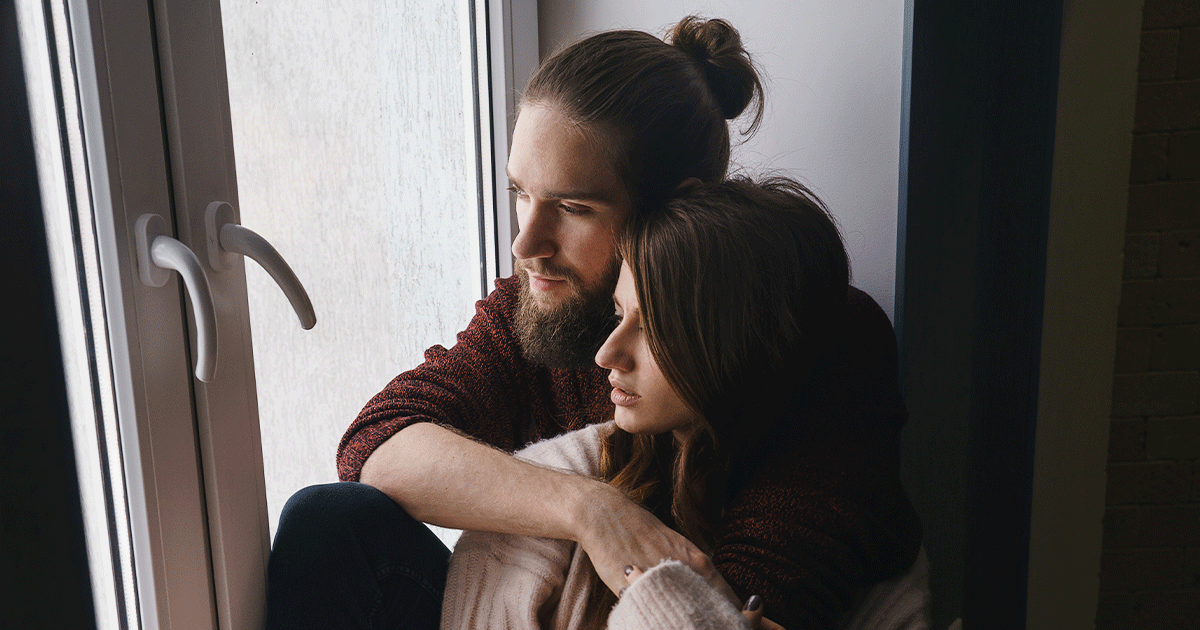 Couple preparing for parenthood and learning how to bond with their newborn.